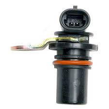 A black automotive sensor component with a three-pin electrical connector, a metal clip, and an orange ring, isolated on a white background.
